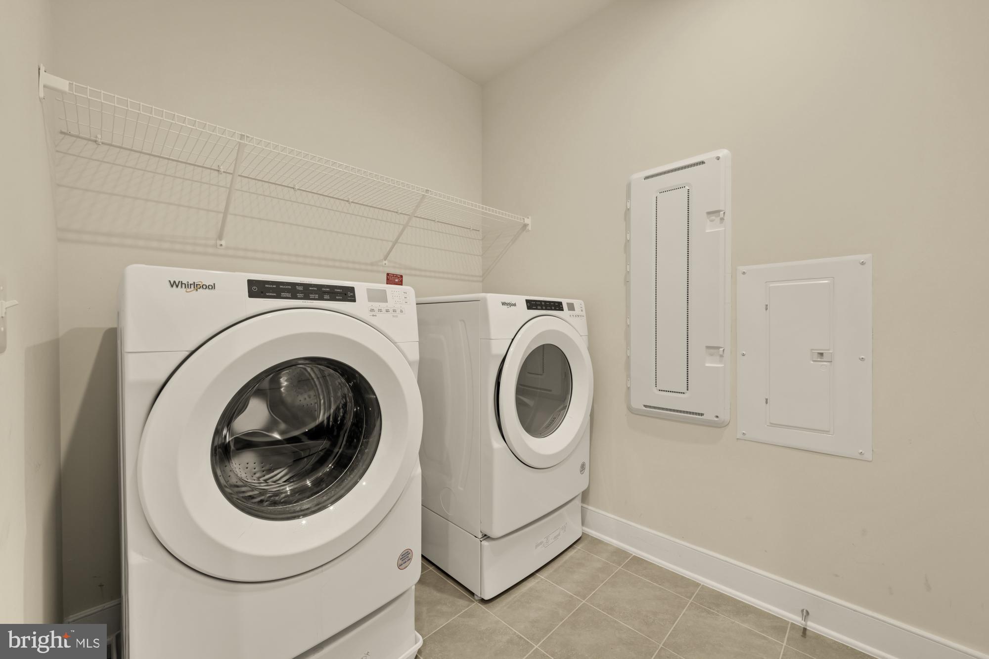 2320 Field Point Road, Unit 4304 Herndon, VA 20171 - Photo 34 of 43 a utility room with dryer and washer