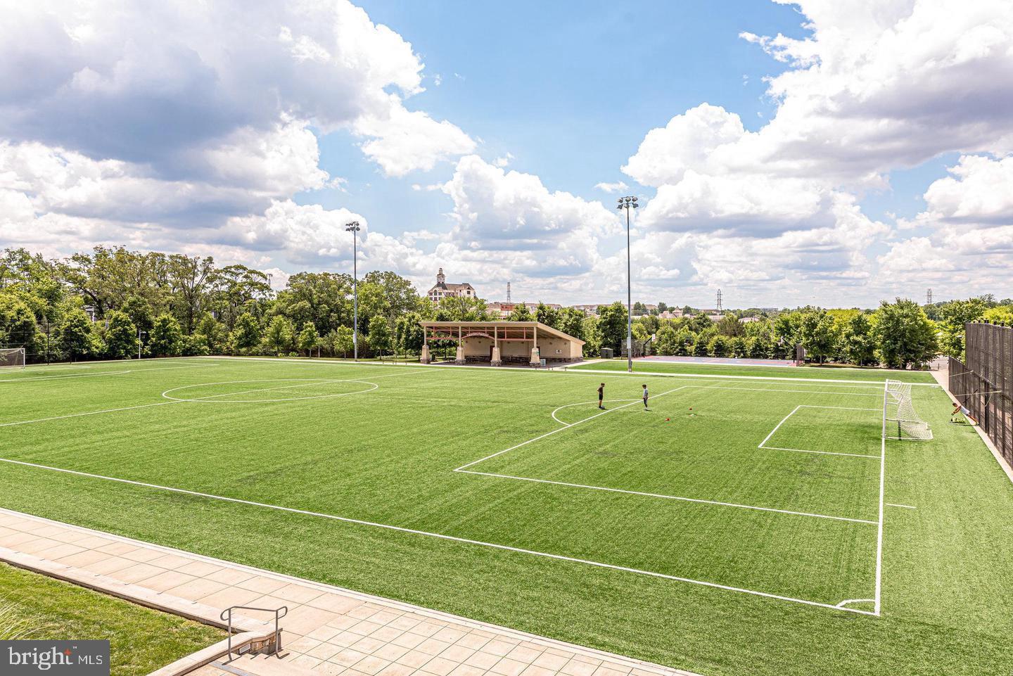 2320 Field Point Road, Unit 4304 Herndon, VA 20171 - Photo 40 of 43 a view of an outdoor space and tennis court