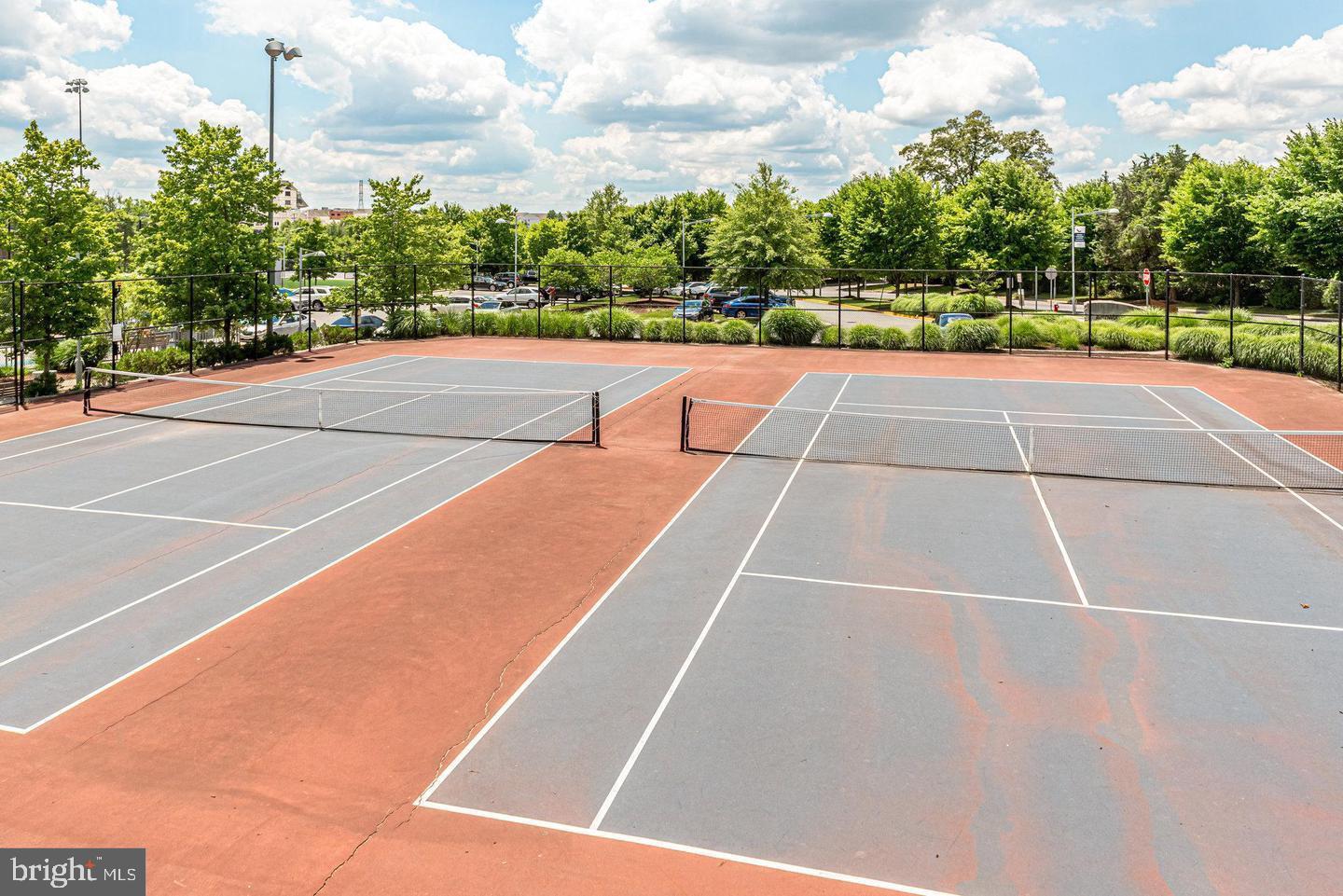 2320 Field Point Road, Unit 4304 Herndon, VA 20171 - Photo 42 of 43 a view of a tennis court
