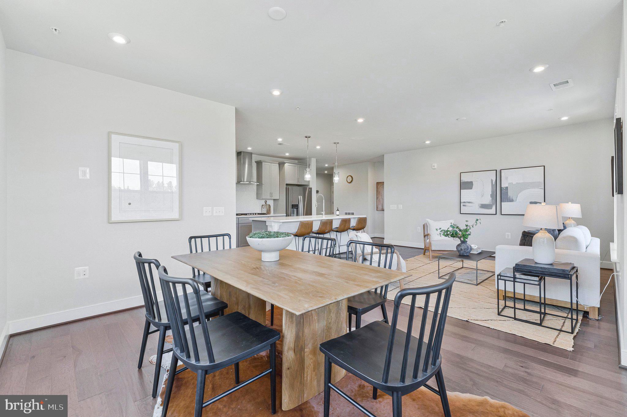2320 Field Point Road, Unit 4304 Herndon, VA 20171 - Photo 7 of 42 a view of a dining room with furniture