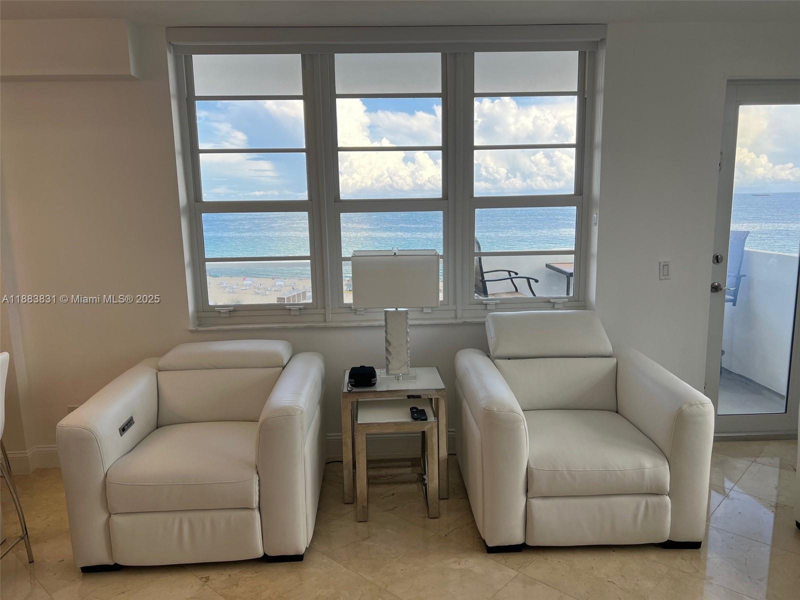 100 Lincoln Road, Unit 848 Miami Beach, FL 33139 - Photo 12 of 68 a living room with furniture and a window