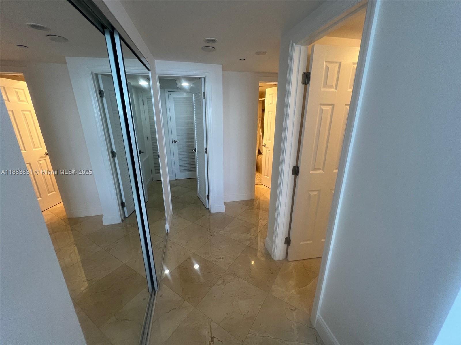 100 Lincoln Road, Unit 848 Miami Beach, FL 33139 - Photo 25 of 68 a bathroom with a glass door shower and a sink
