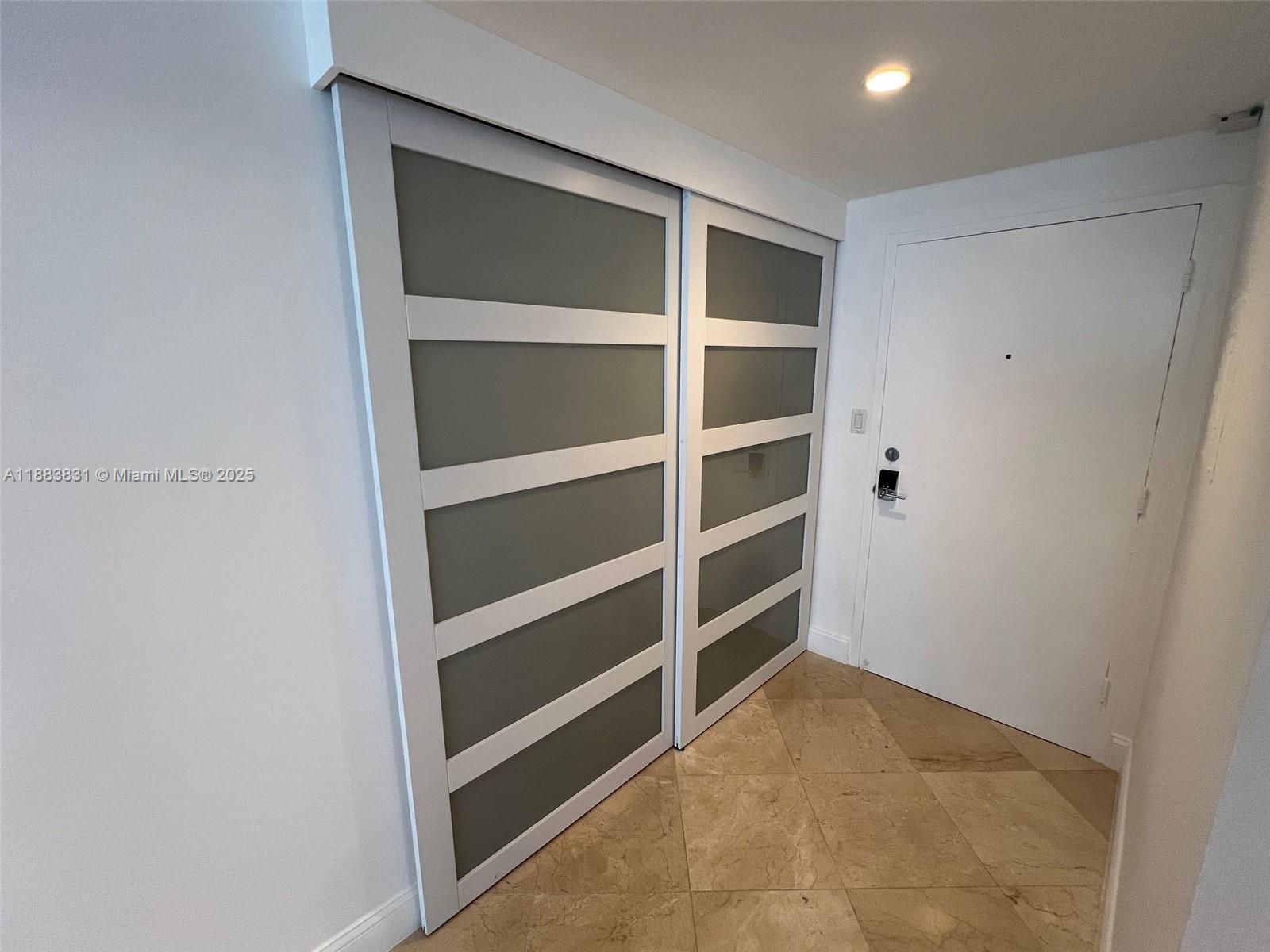 100 Lincoln Road, Unit 848 Miami Beach, FL 33139 - Photo 33 of 68 a view of an empty walk in closet