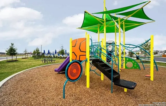 a view of a park with slide