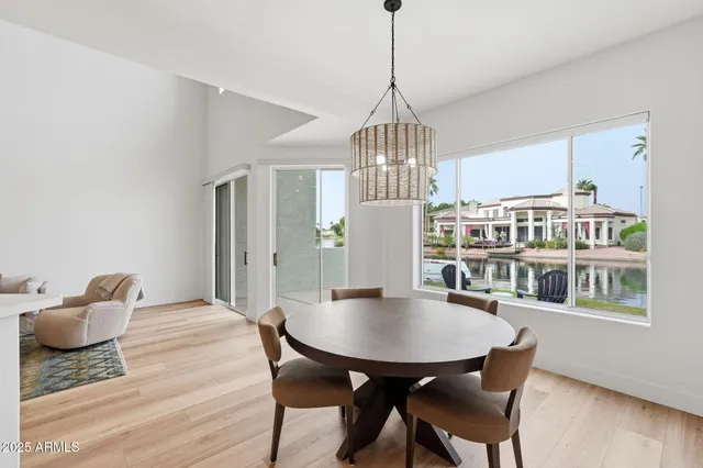a workspace with furniture hardwood and a window
