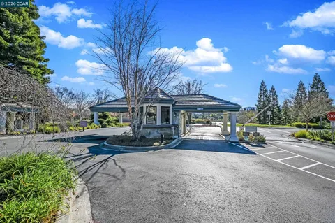 a view of a patio with a yard