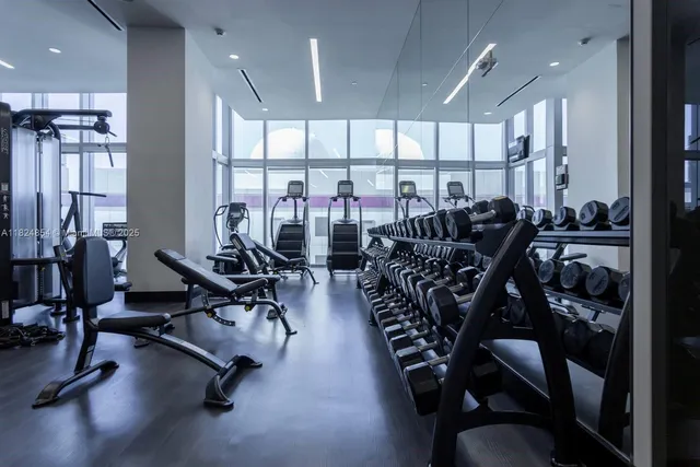 a view of a patio with a table and chairs