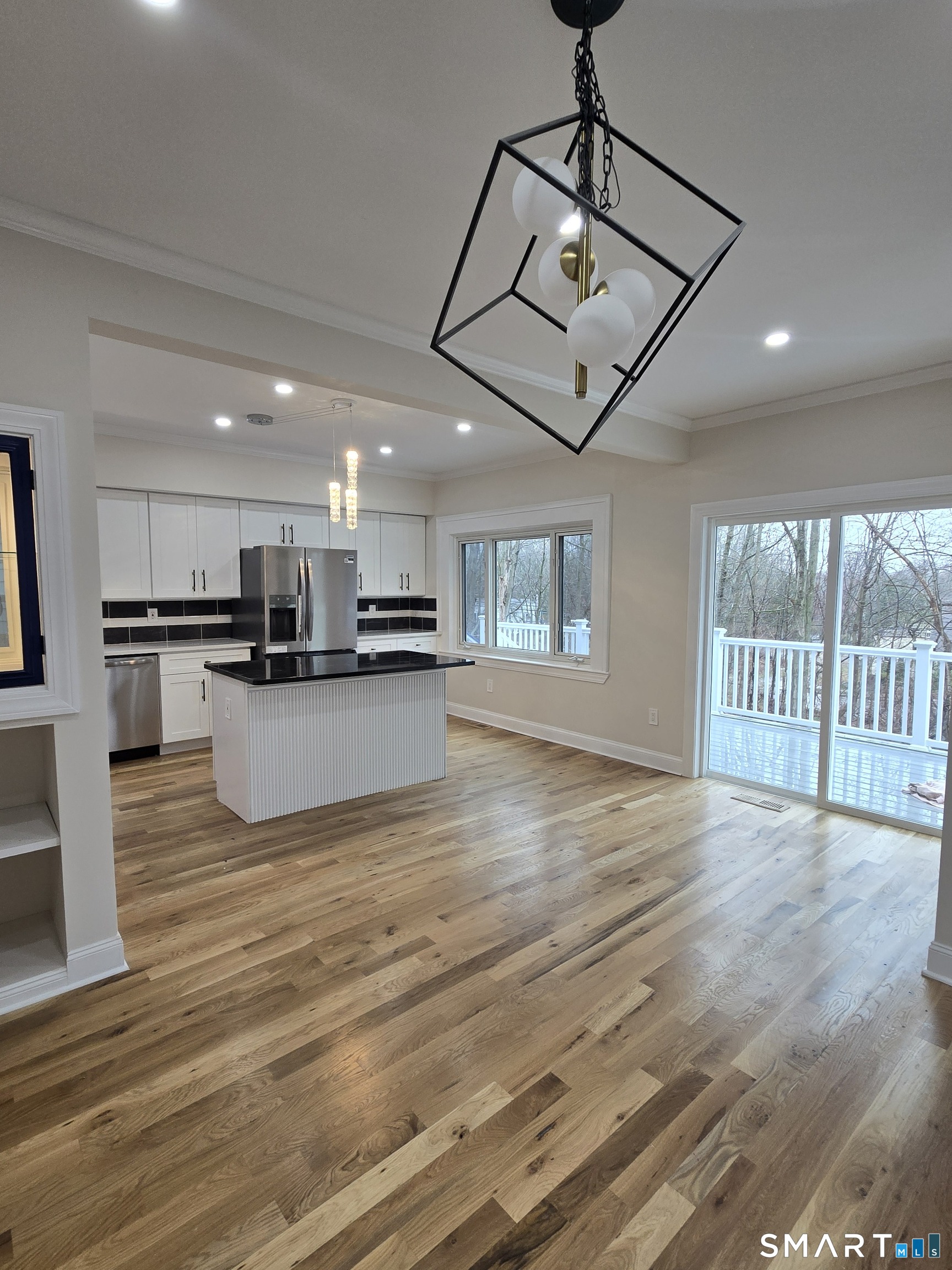 8 Pine Street Norwich, CT 06360 - Photo 14 of 27 a view of kitchen and kitchen with wooden floor