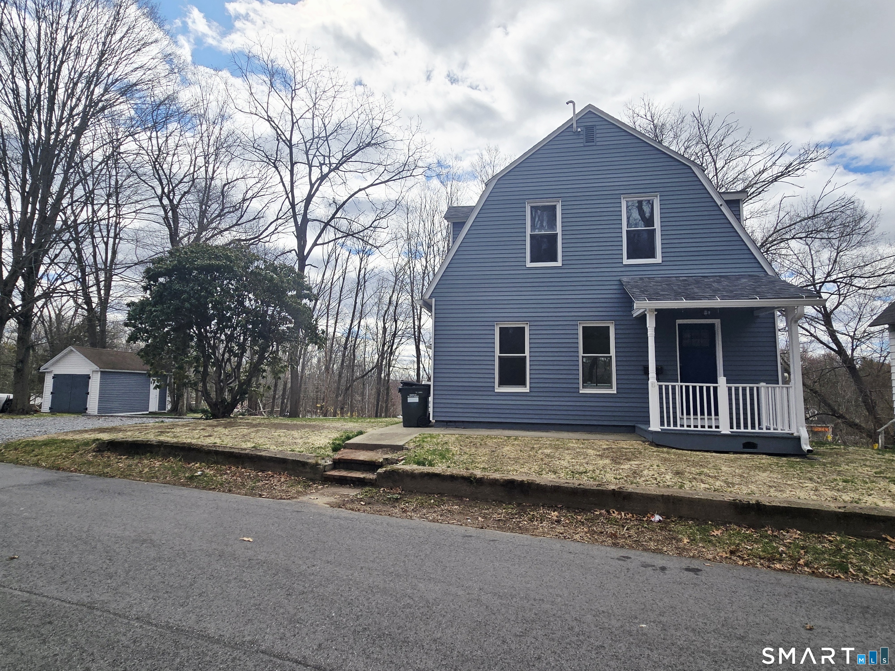 8 Pine Street Norwich, CT 06360 - Photo 3 of 27 a house that has a tree in front of the house