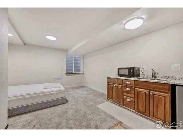 a view of a livingroom with wooden floor