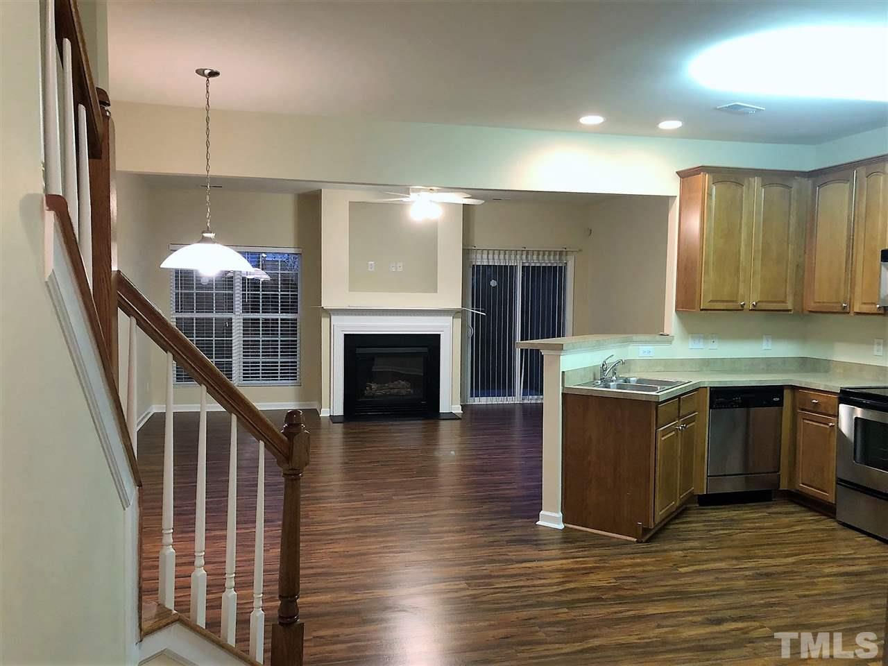 3012 Winding Waters Way, Unit 978 Raleigh, NC 27614 - Photo 3 of 11 View of kitchen and family room area from hall