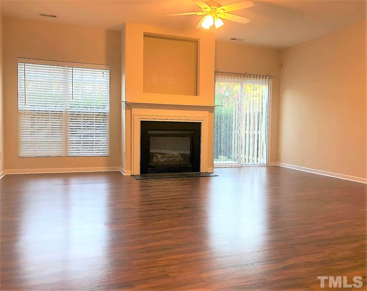 3012 Winding Waters Way, Unit 978 Raleigh, NC 27614 - Photo 5 of 11 Lots of natural light and sliding glass doors that take you to the private patio space