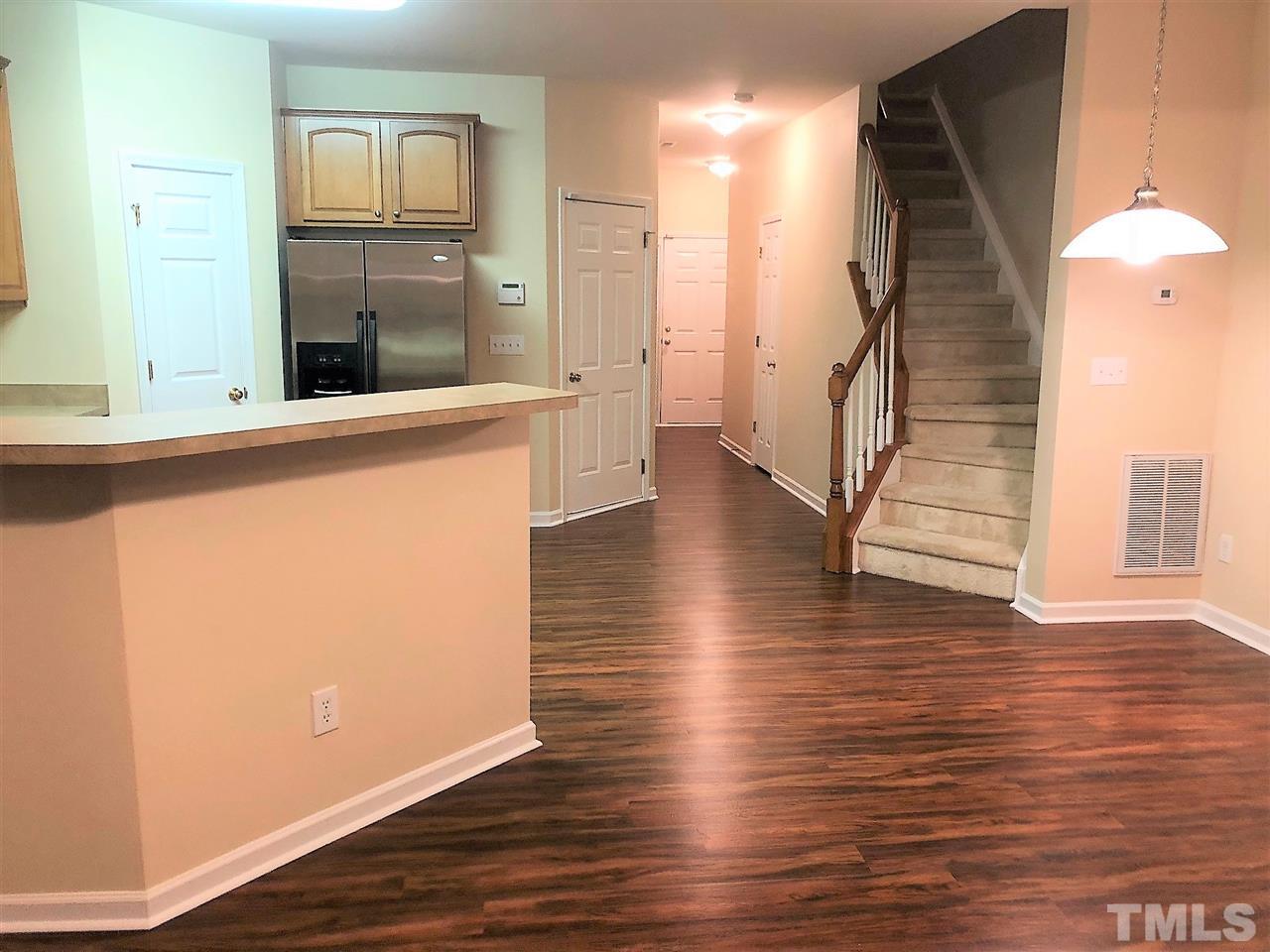 3012 Winding Waters Way, Unit 978 Raleigh, NC 27614 - Photo 6 of 11 View from family room into the dining area and kitchen