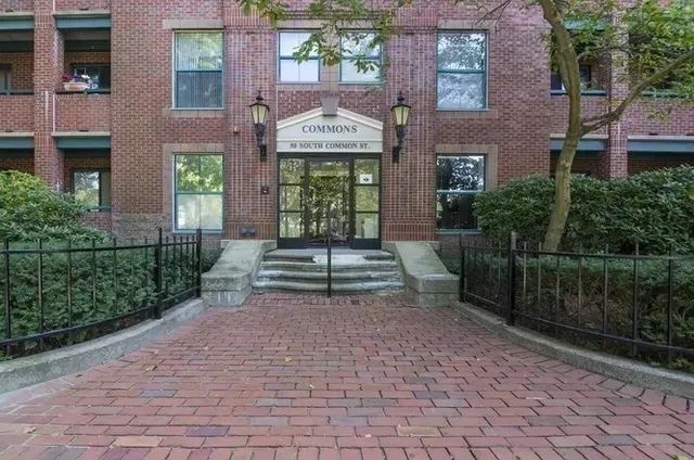 a view of a building with a street