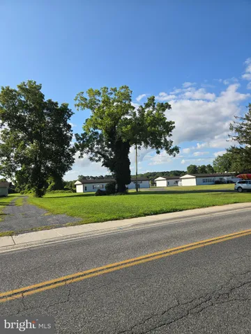 a view of a house with a big yard