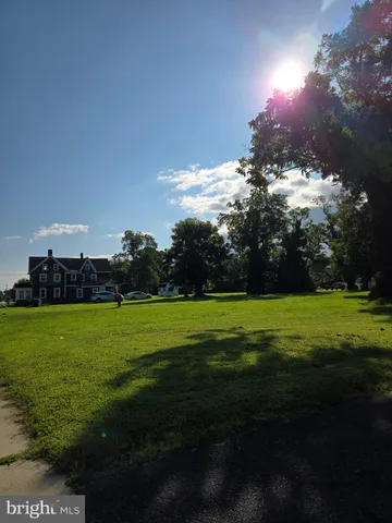 a view of a golf course with a lake