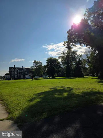a view of a golf course with a lake