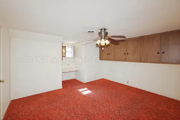 a view of a room with an empty space