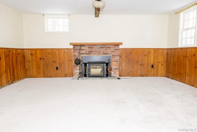 a view of empty room with windows