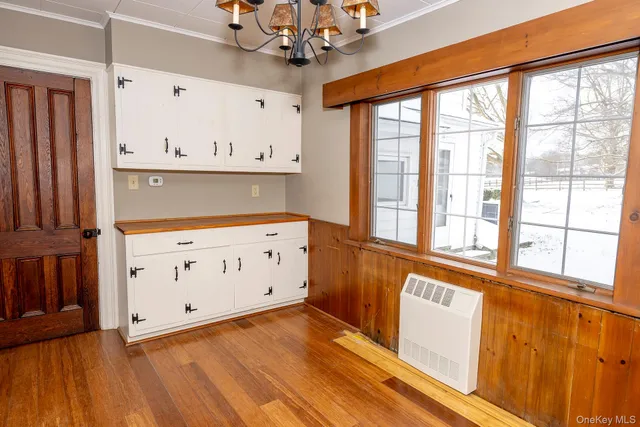 a view of a kitchen with microwave and stove