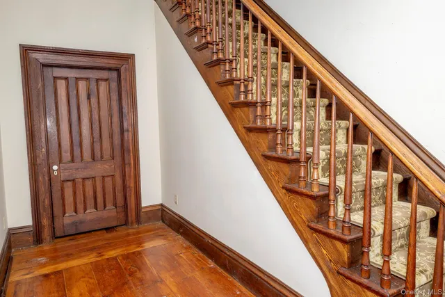 a view of an entryway with staircase
