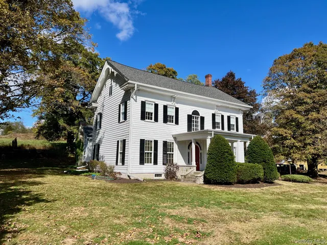 a house view with a garden space