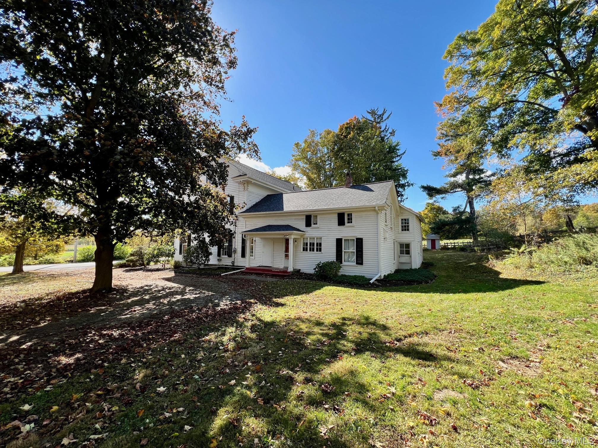 79 Camby Road Millbrook, NY 12545 - Photo 3 of 34 a view of a house with a yard