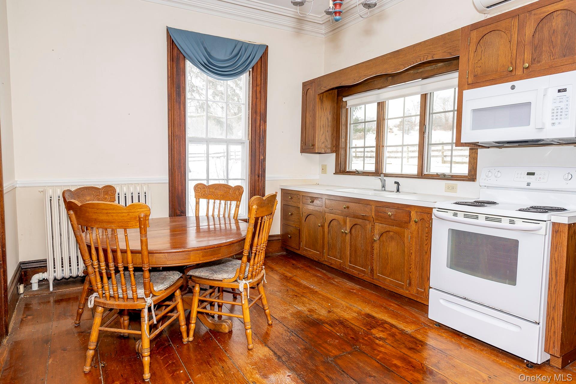 79 Camby Road Millbrook, NY 12545 - Photo 10 of 34 a view of a dining room with furniture and wooden floor