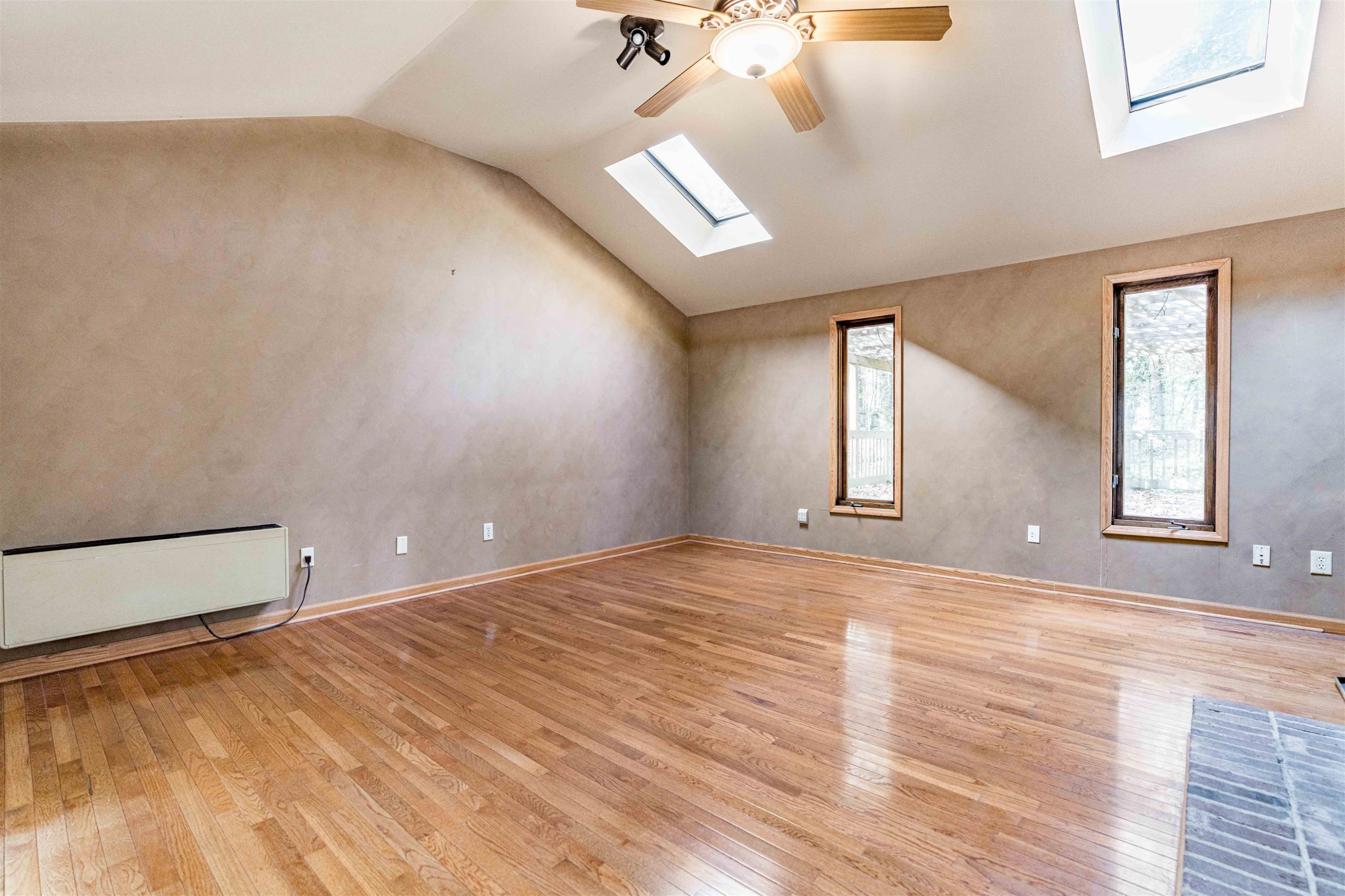 3105 Rutledge Court Raleigh, NC 27613 - Photo 23 of 48 Rec room with wood stove
