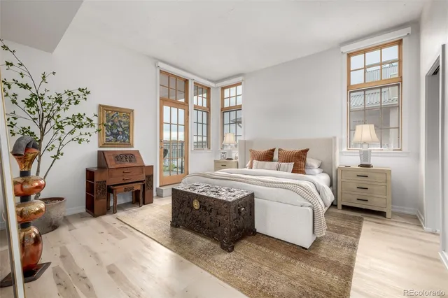 a bathroom with a white toilet and a shower