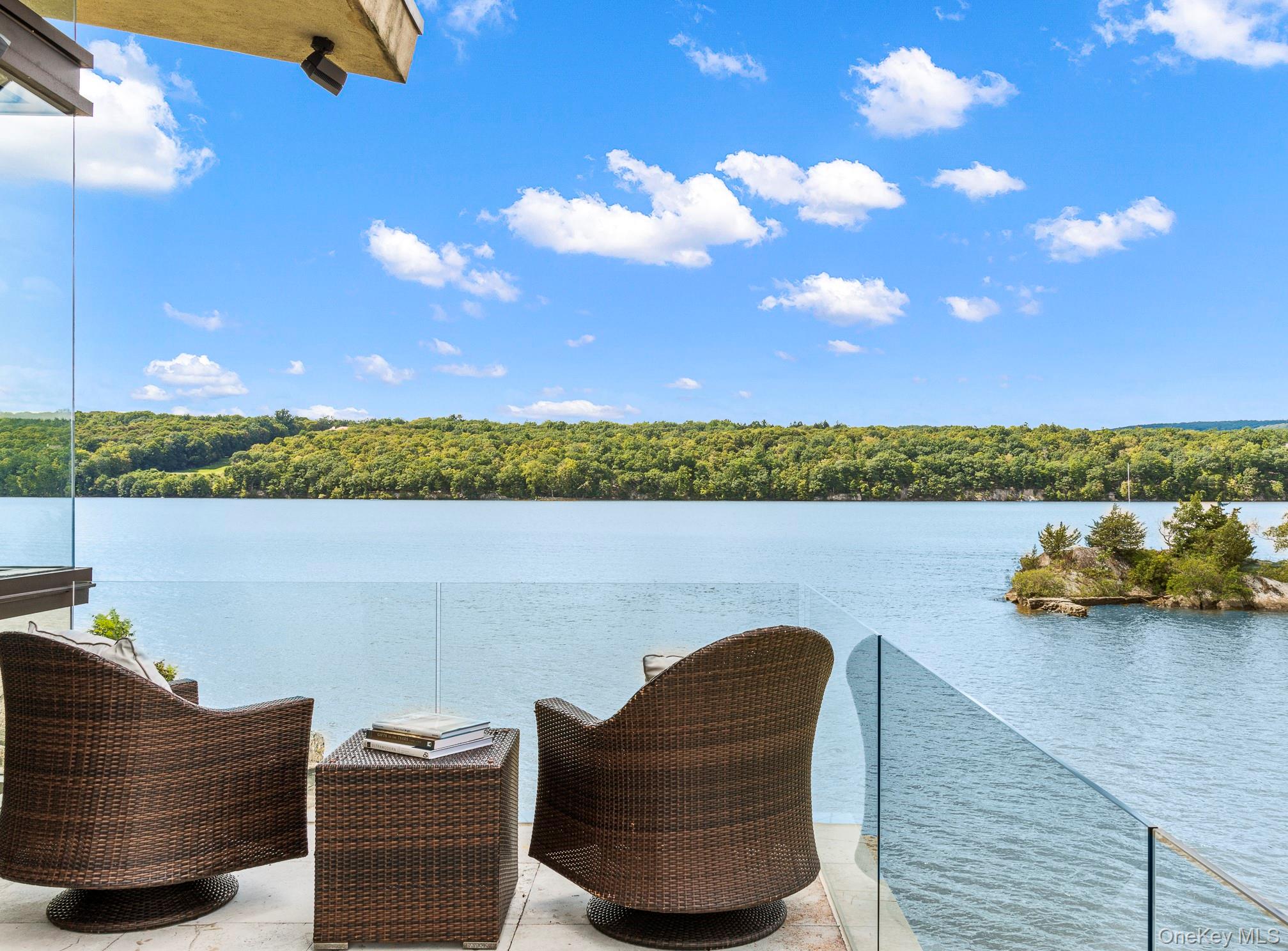 46 Ledgerock Lane Hyde Park, NY 12538 - Photo 12 of 37 a view of a lake from a balcony