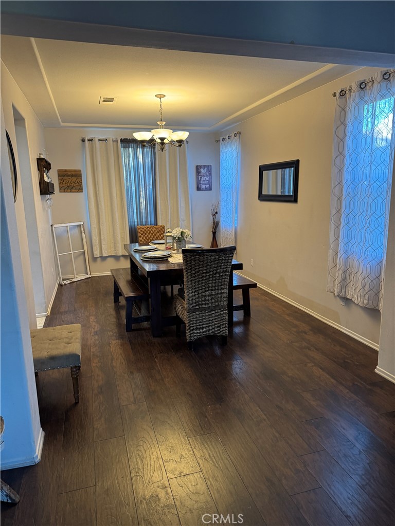 4300 Cloudywing Road Hemet, CA 92545 - Photo 11 of 29 a view of a workspace with furniture and wooden floor