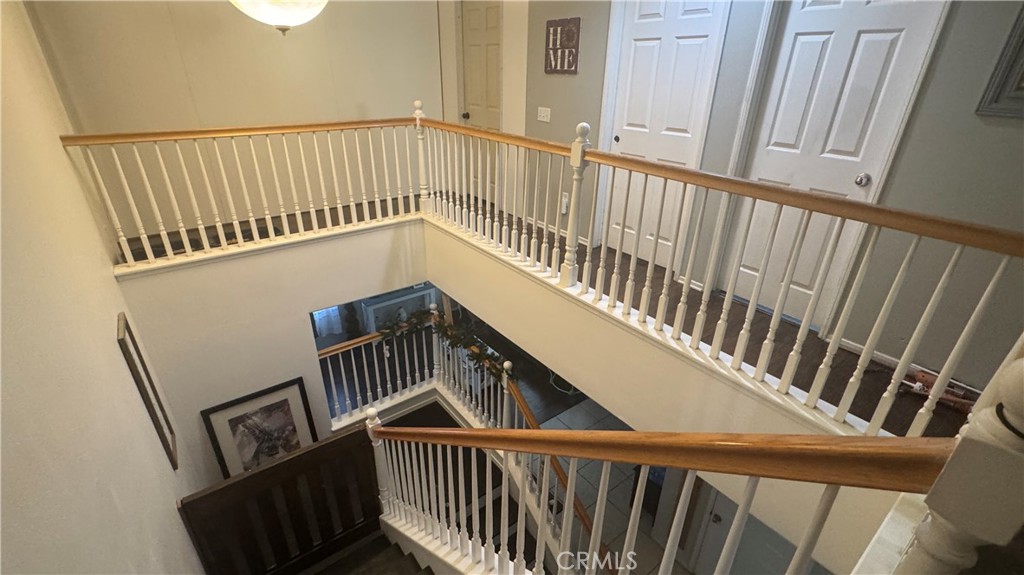 4300 Cloudywing Road Hemet, CA 92545 - Photo 15 of 29 a view of staircase with railing and white walls