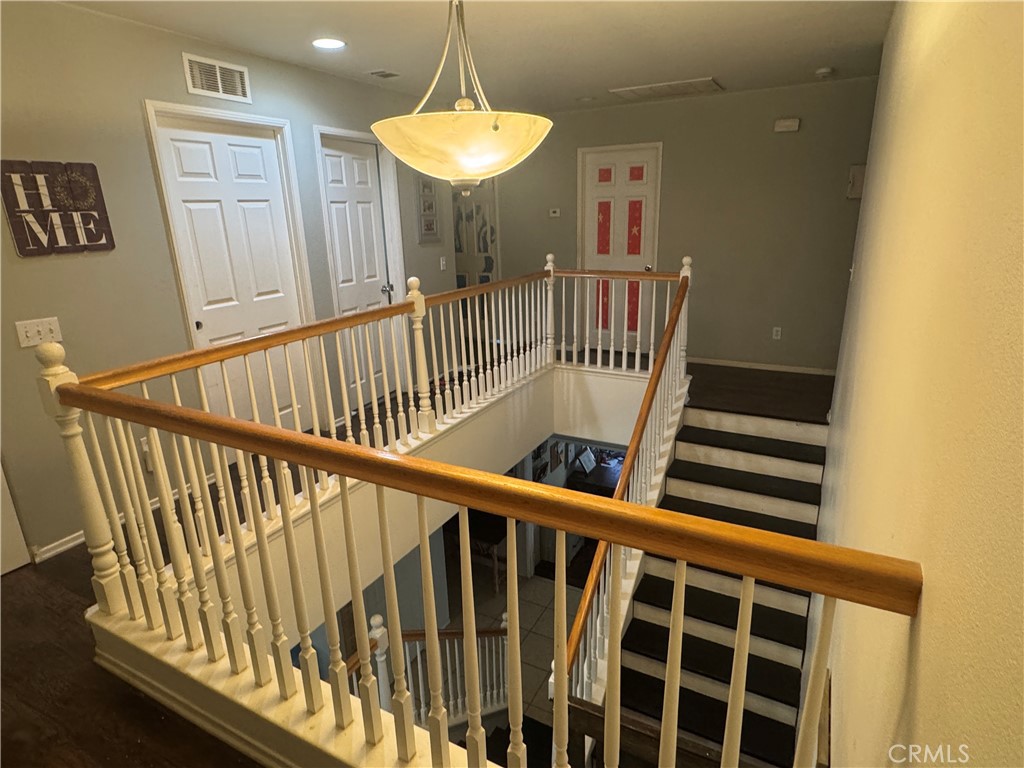4300 Cloudywing Road Hemet, CA 92545 - Photo 16 of 29 a view of staircase with railing and a window