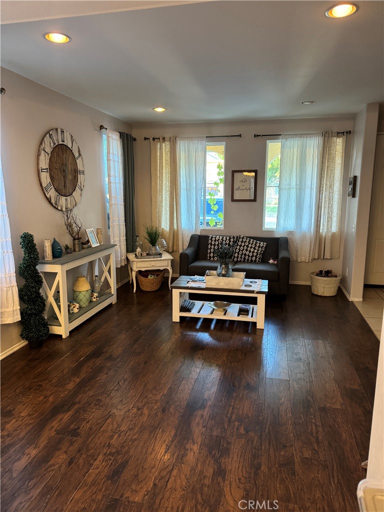 4300 Cloudywing Road Hemet, CA 92545 - Photo 2 of 29 a living room with furniture and a wooden floor
