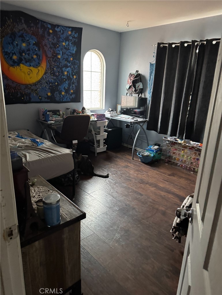 4300 Cloudywing Road Hemet, CA 92545 - Photo 25 of 29 a living room with furniture a flat screen tv and a window