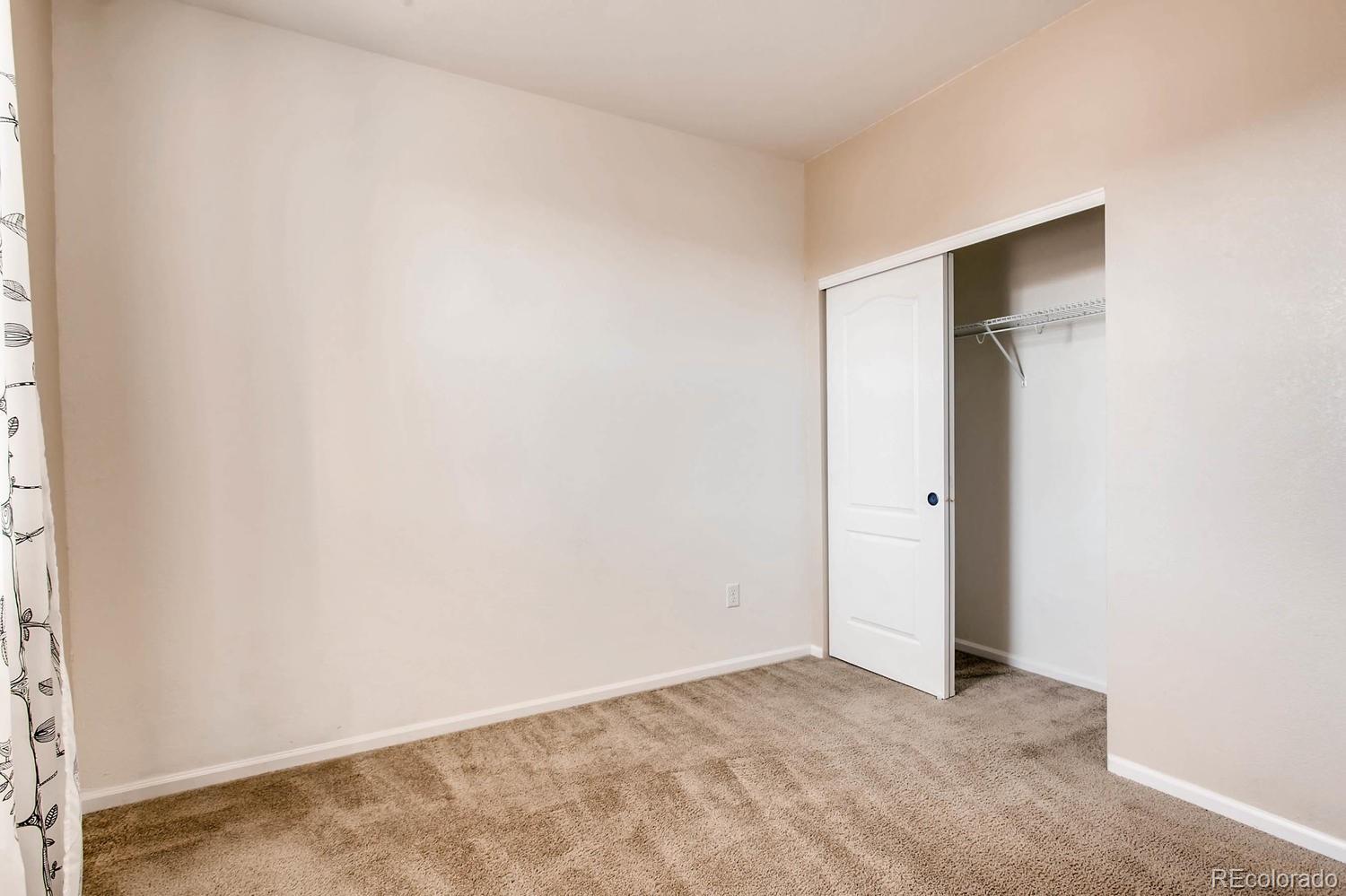 9511 Loggia Street, Unit C Highlands Ranch, CO 80126 - Photo 16 of 32 a view of an empty room