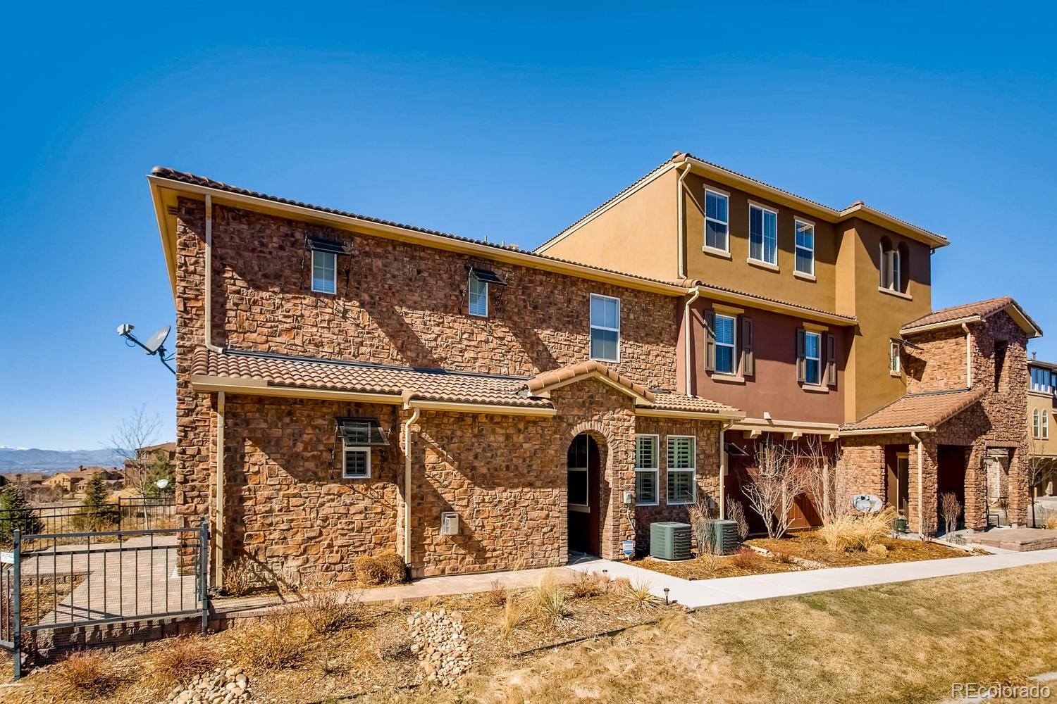 9511 Loggia Street, Unit C Highlands Ranch, CO 80126 - Photo 2 of 32 a front view of a building