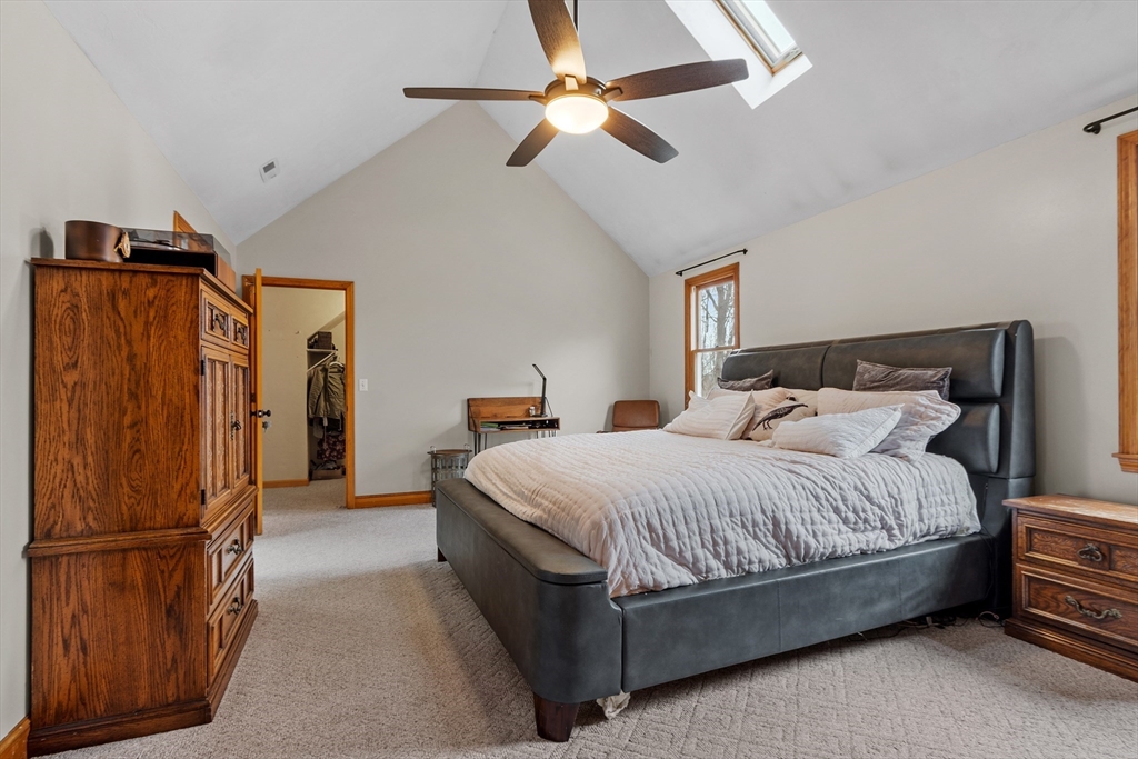 76 Woobly Road Bolton, MA 01740 - Photo 13 of 27 a bedroom with bed mirror and window