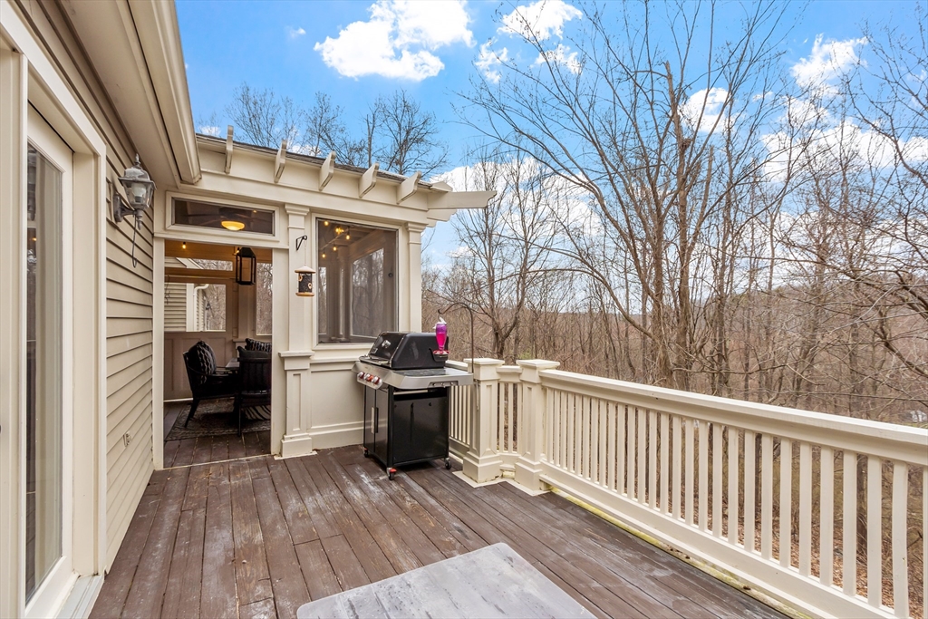 76 Woobly Road Bolton, MA 01740 - Photo 26 of 27 a view of a house with backyard and sitting area