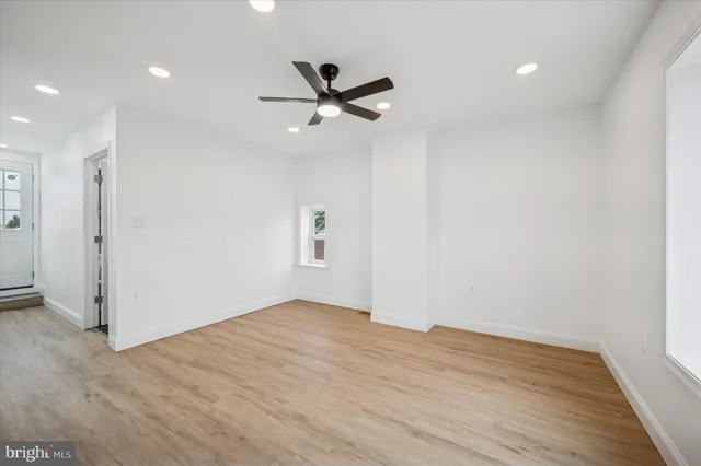 a bathroom with a shower and a sink