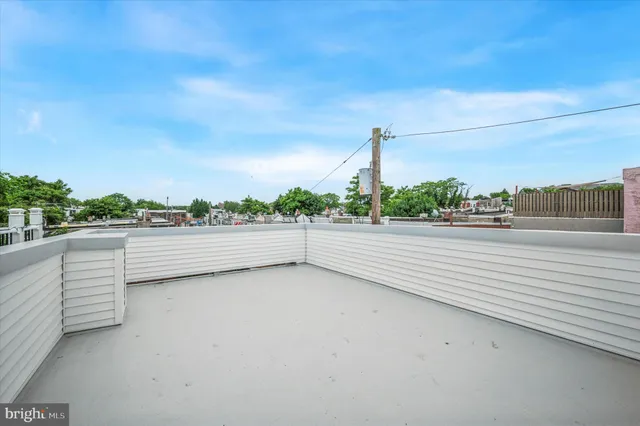 a view of a car park in front of building
