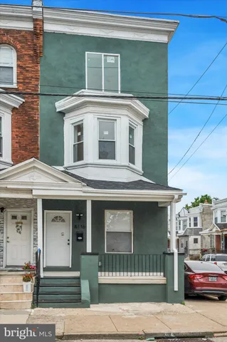 a front view of a house with garage