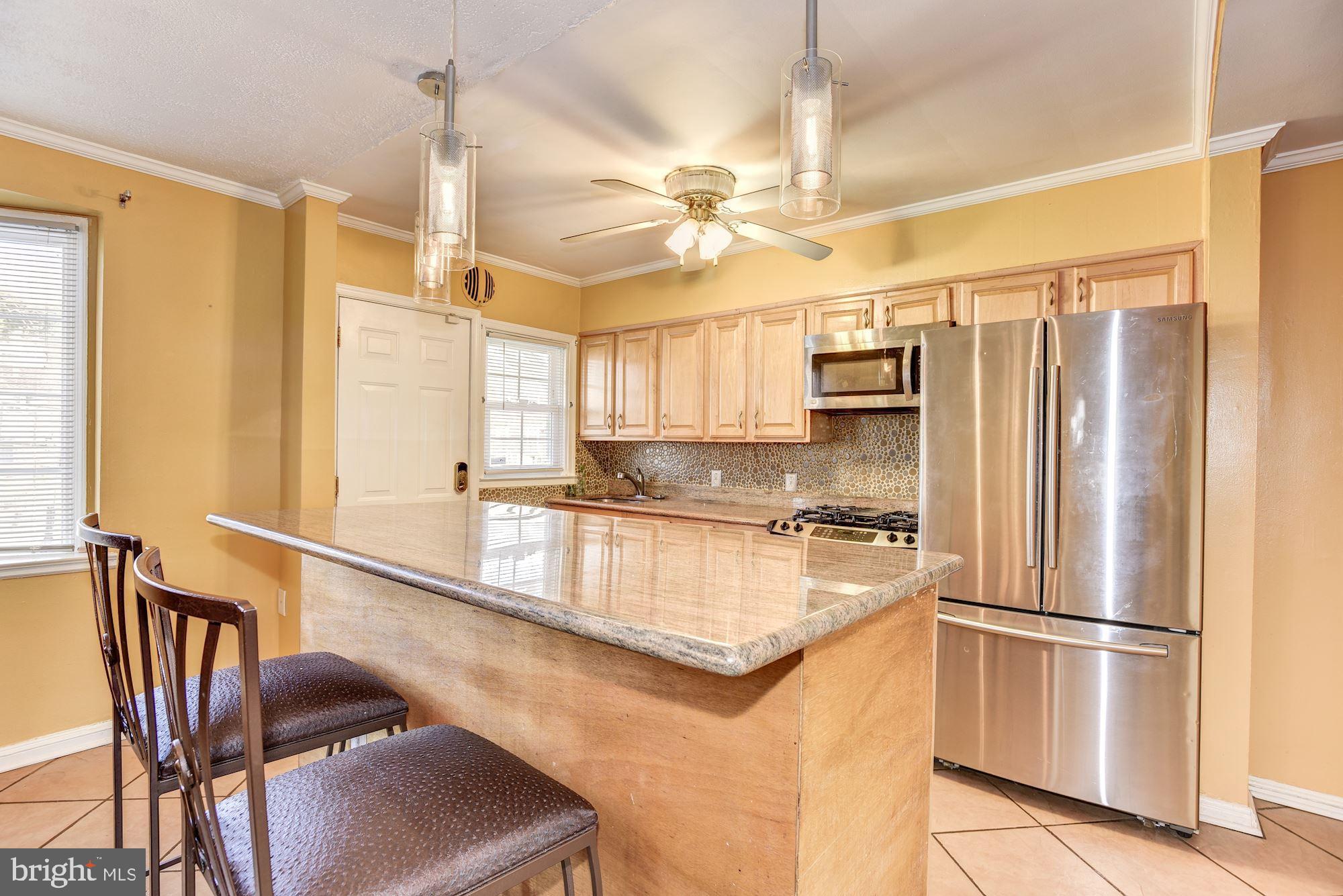 1320 Kitmore Road Baltimore, MD 21239 - Photo 8 of 26 Eat-In Kitchen | Expansive Center Island