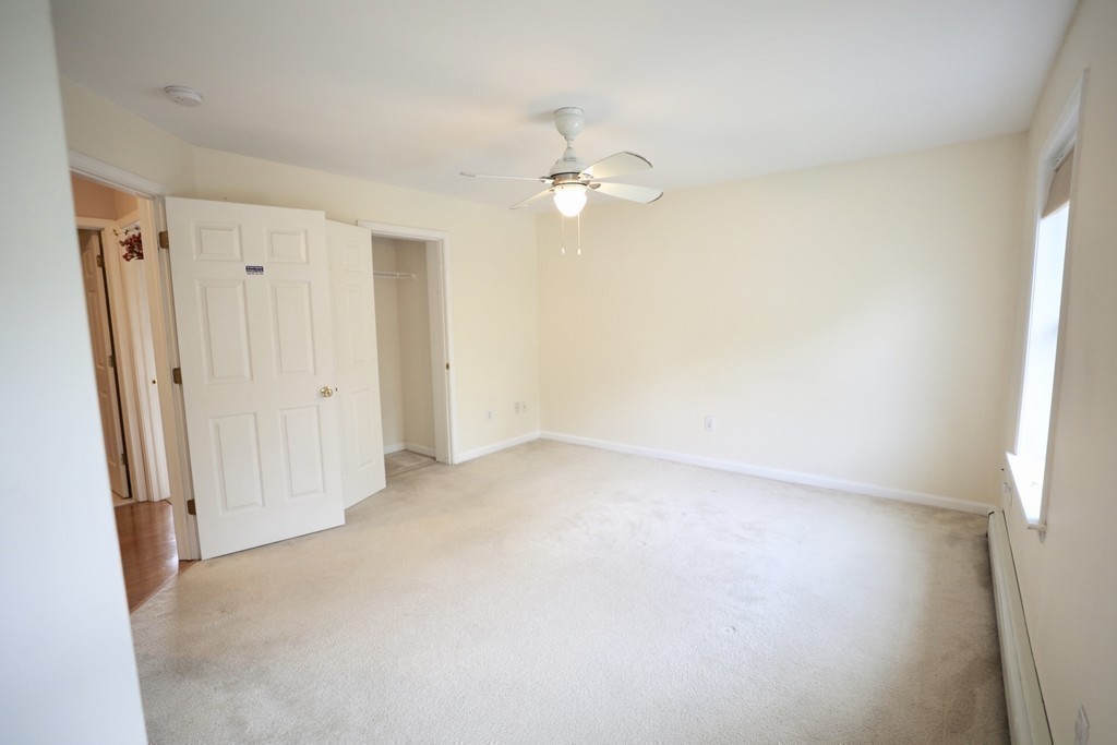 167 Orient Street Worcester, MA 01604 - Photo 15 of 29 an empty room with a mirror