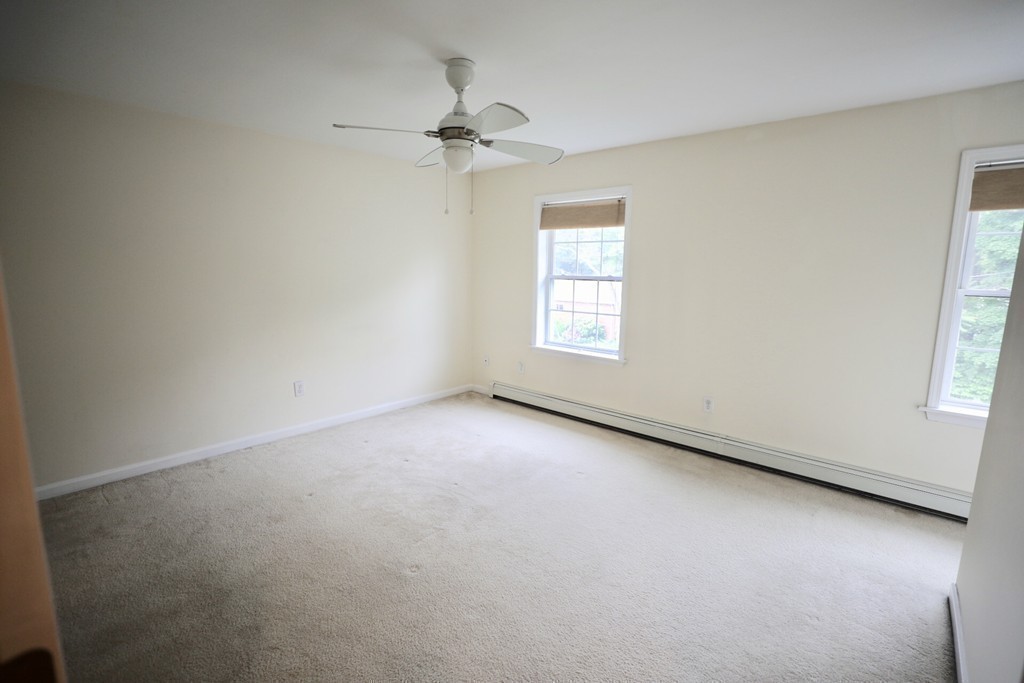 167 Orient Street Worcester, MA 01604 - Photo 16 of 29 an empty room with windows