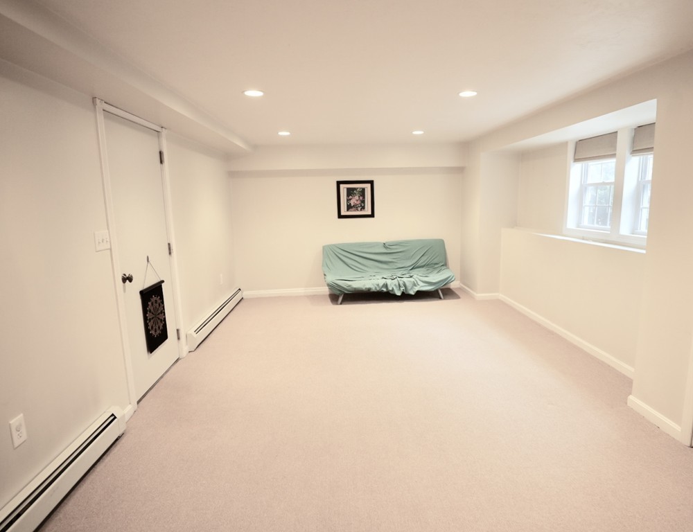167 Orient Street Worcester, MA 01604 - Photo 24 of 29 a living room with a couch and a window