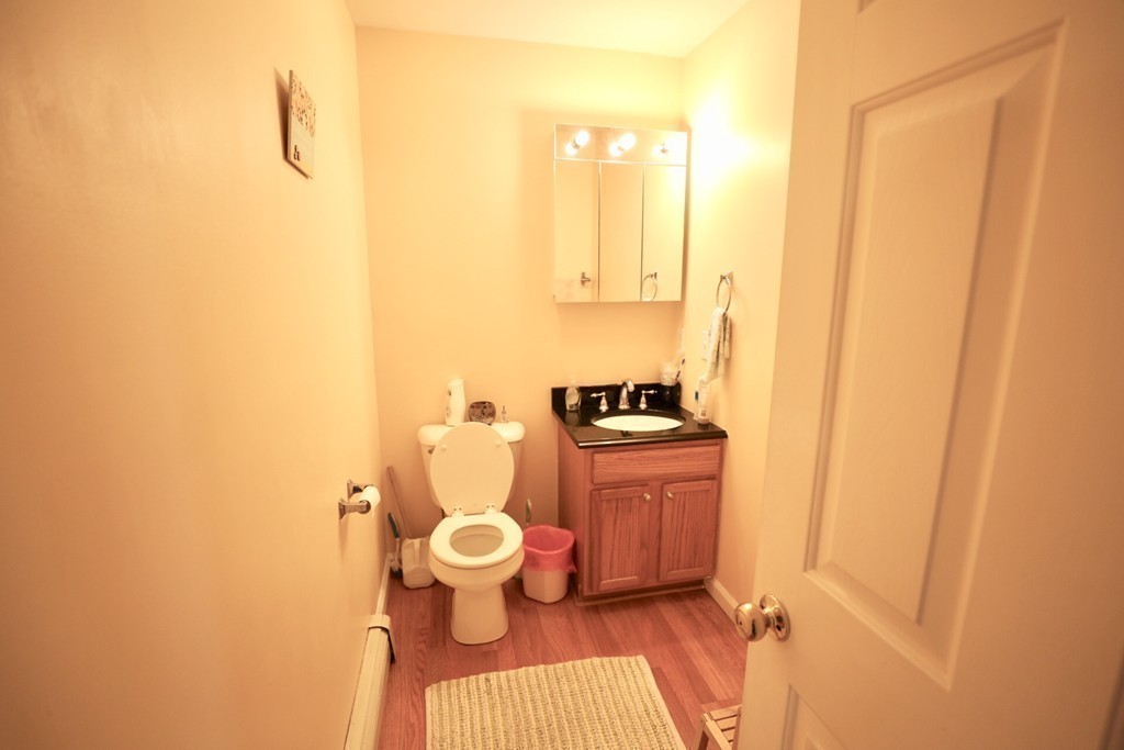 167 Orient Street Worcester, MA 01604 - Photo 25 of 29 a bathroom with a sink and a toilet