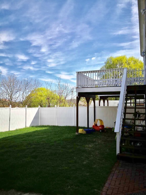 167 Orient Street Worcester, MA 01604 - Photo 28 of 29 a view of a house with a yard