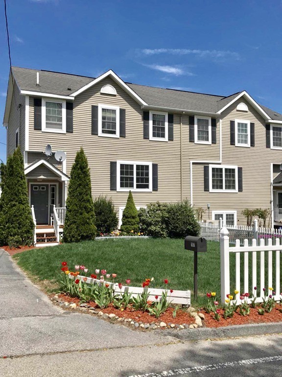 167 Orient Street Worcester, MA 01604 - Photo 29 of 29 a front view of a house with a yard